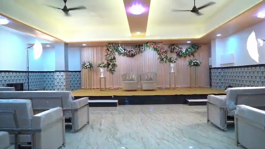 Wedding video frame showing stage decor close view